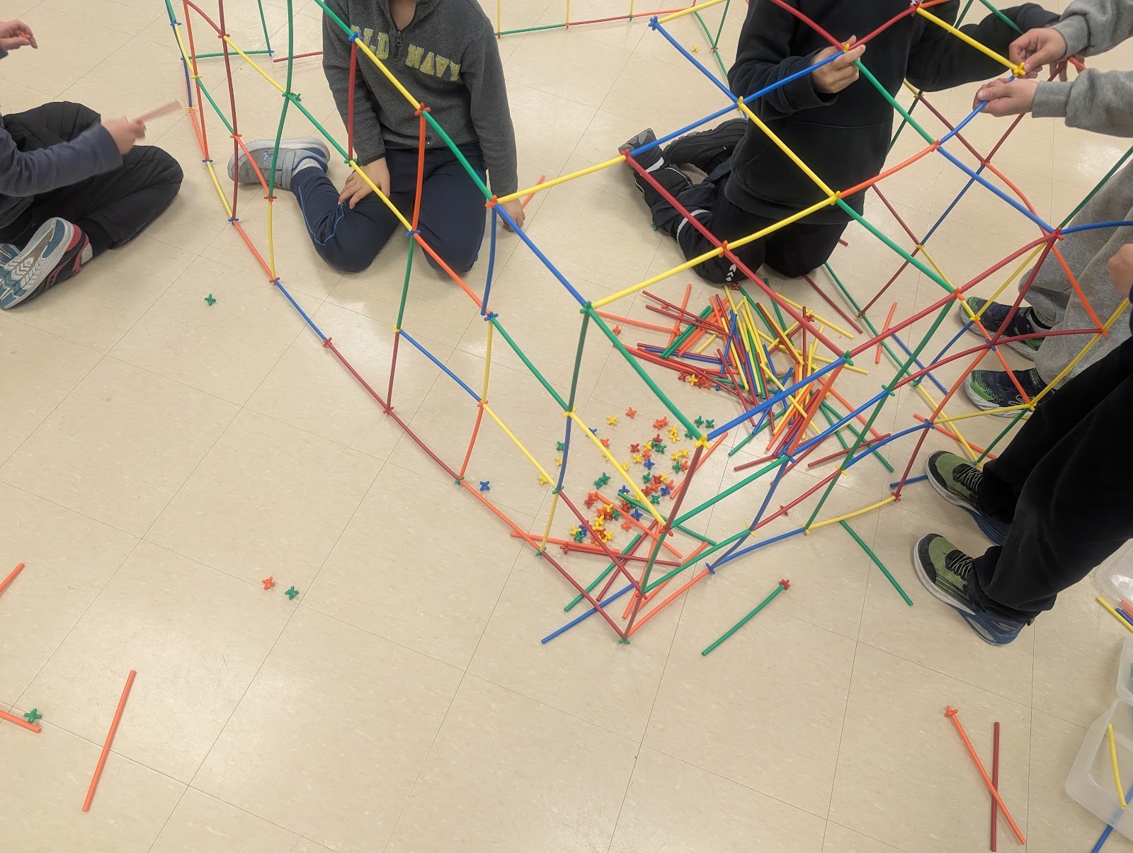 student construction with sticks and connectors